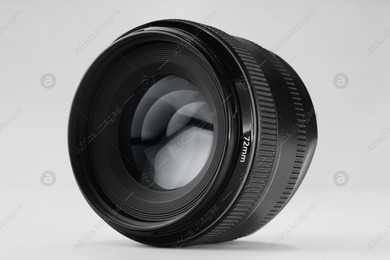 Camera lens on white background. Photographer's equipment Photo of Camera lens on white background. Photographer's equipment