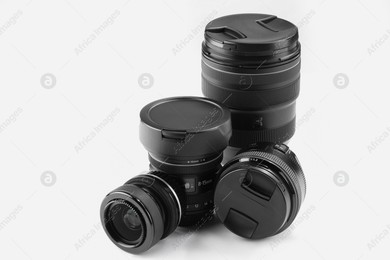 Camera lens on white background. Photographer's equipment Photo of Camera lens on white background. Photographer's equipment
