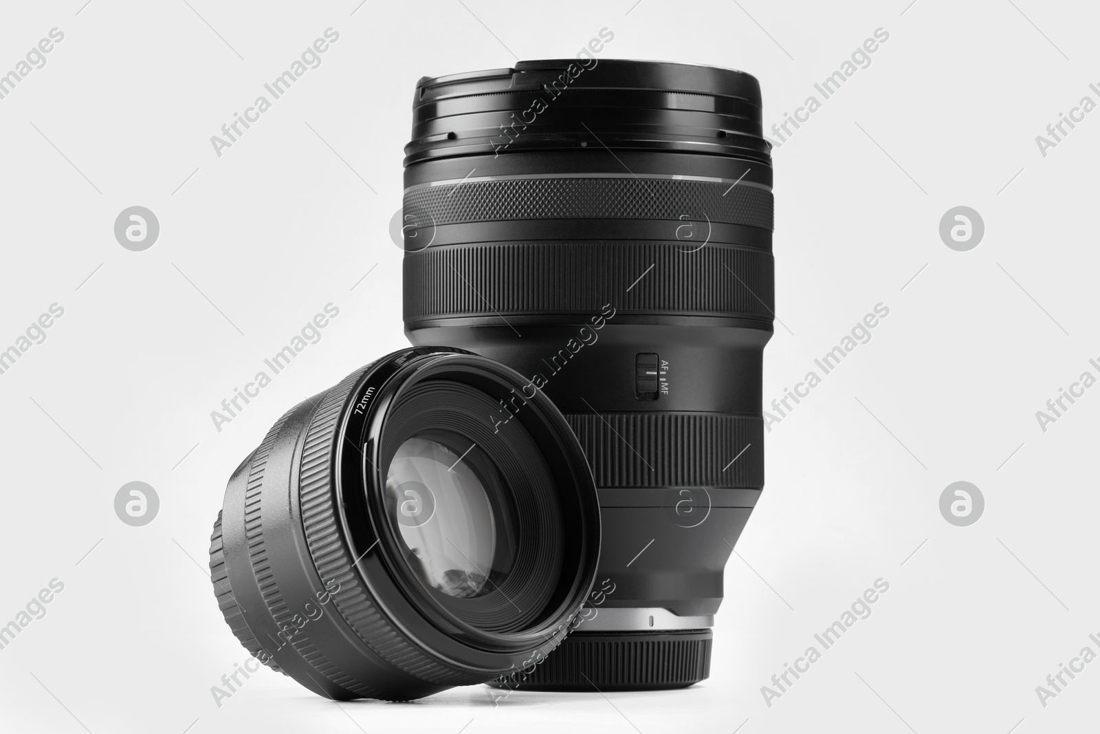 Camera lens on white background. Photographer's equipment Photo of Camera lens on white background. Photographer's equipment