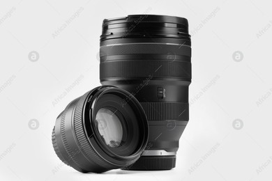 Camera lens on white background. Photographer's equipment Photo of Camera lens on white background. Photographer's equipment