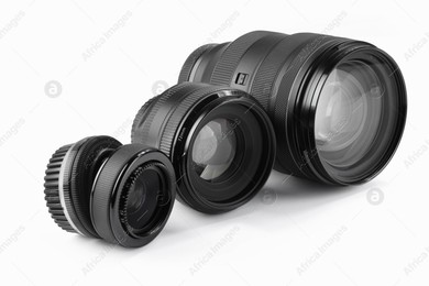 Camera lens on white background. Photographer's equipment Photo of Camera lens on white background. Photographer's equipment
