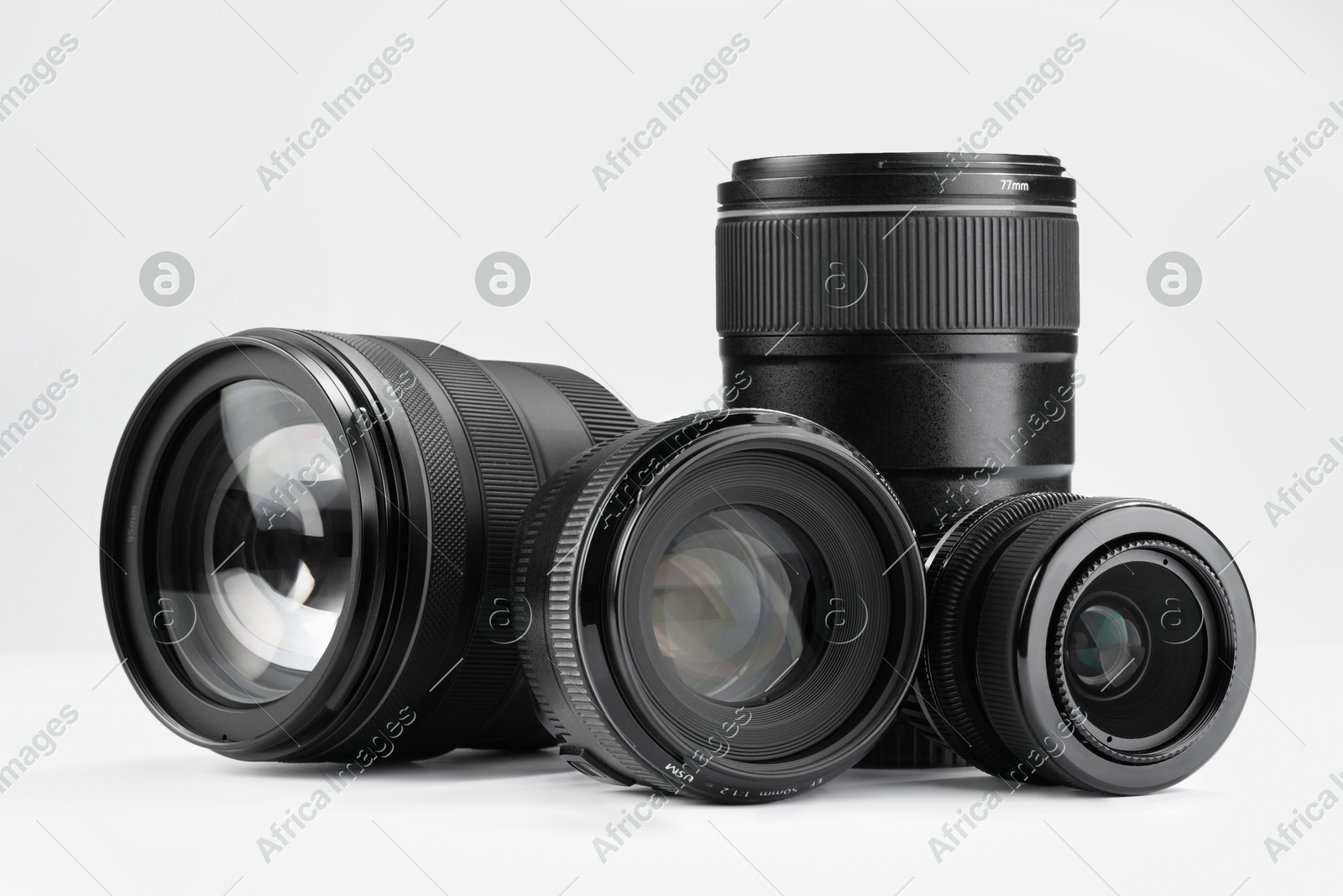 Camera lens on white background. Photographer's equipment Photo of Camera lens on white background. Photographer's equipment