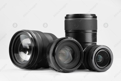 Camera lens on white background. Photographer's equipment Photo of Camera lens on white background. Photographer's equipment