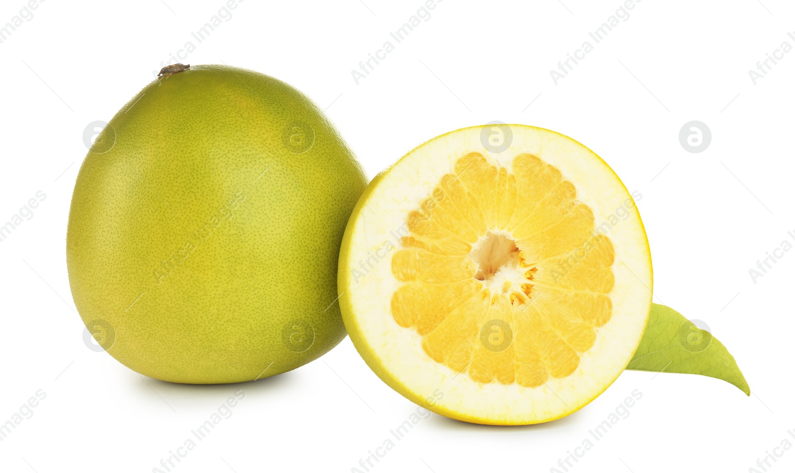 Photo of Fresh cut and whole pomelo fruits isolated on white