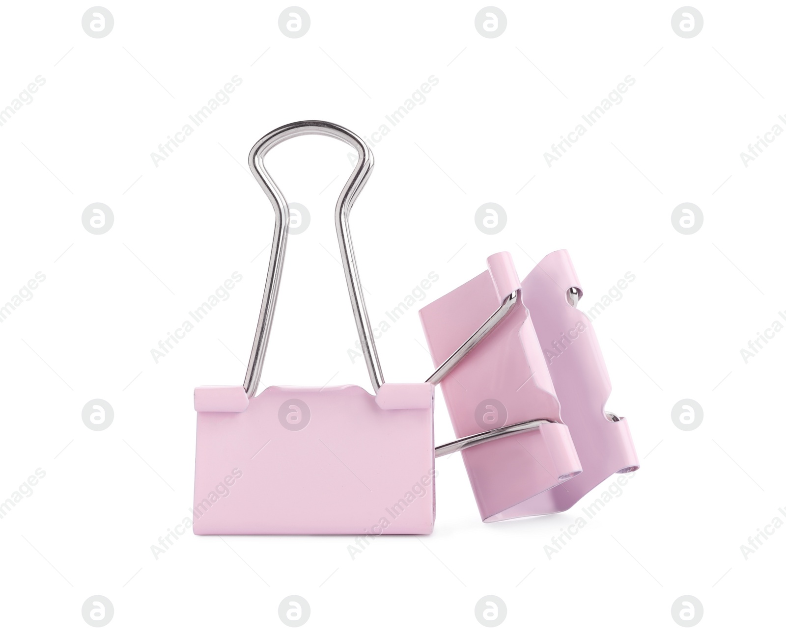 Pink binder clips on white background. Stationery item Photo of Pink binder clips on white background. Stationery item