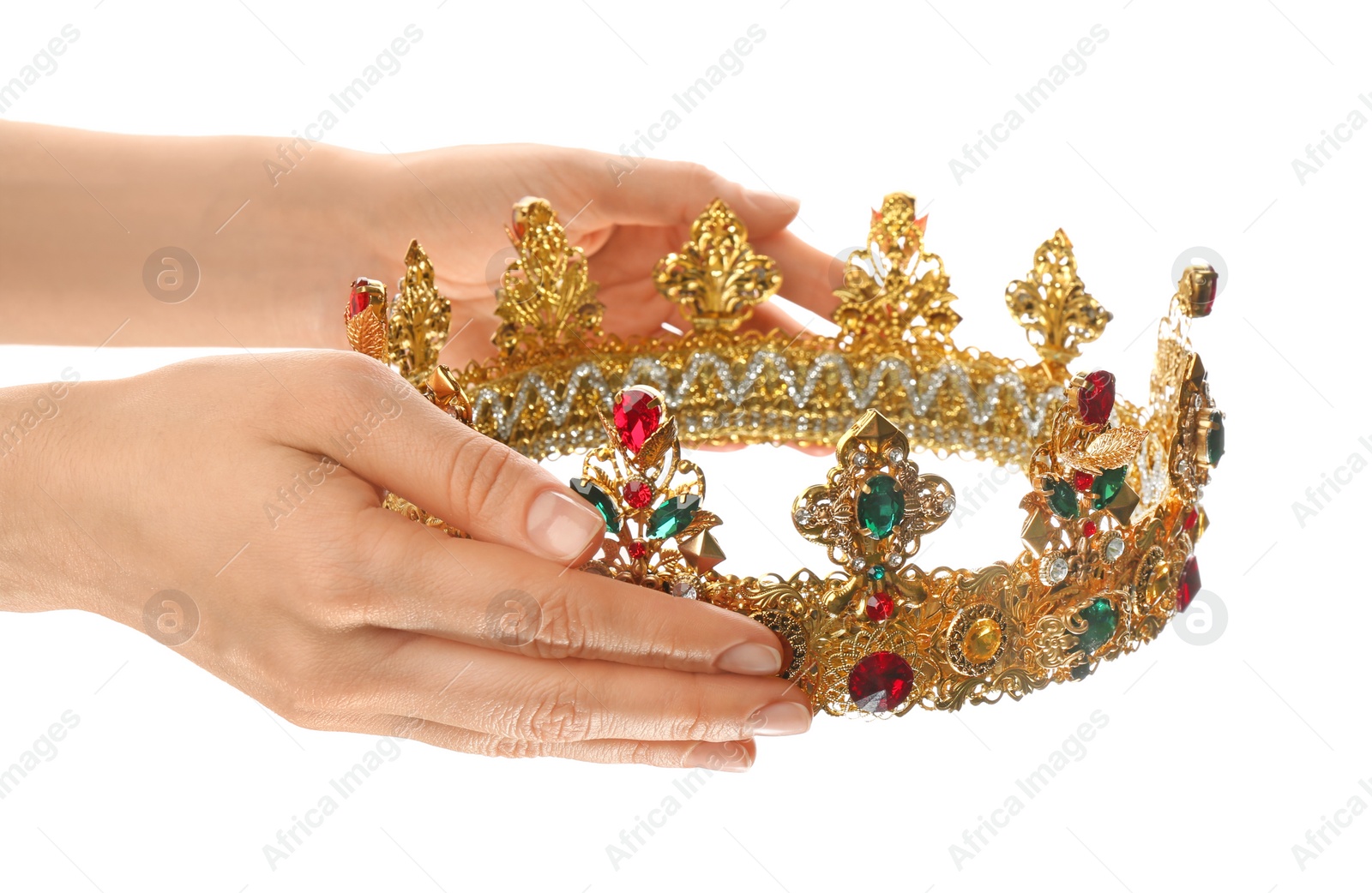 Woman holding beautiful golden crown on white background, closeup. Fantasy item Photo of Woman holding beautiful golden crown on white background, closeup. Fantasy item