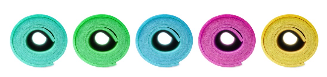 Set with different bright rolled camping mats on white background. Banner design Image of Set with different bright rolled camping mats on white background. Banner design