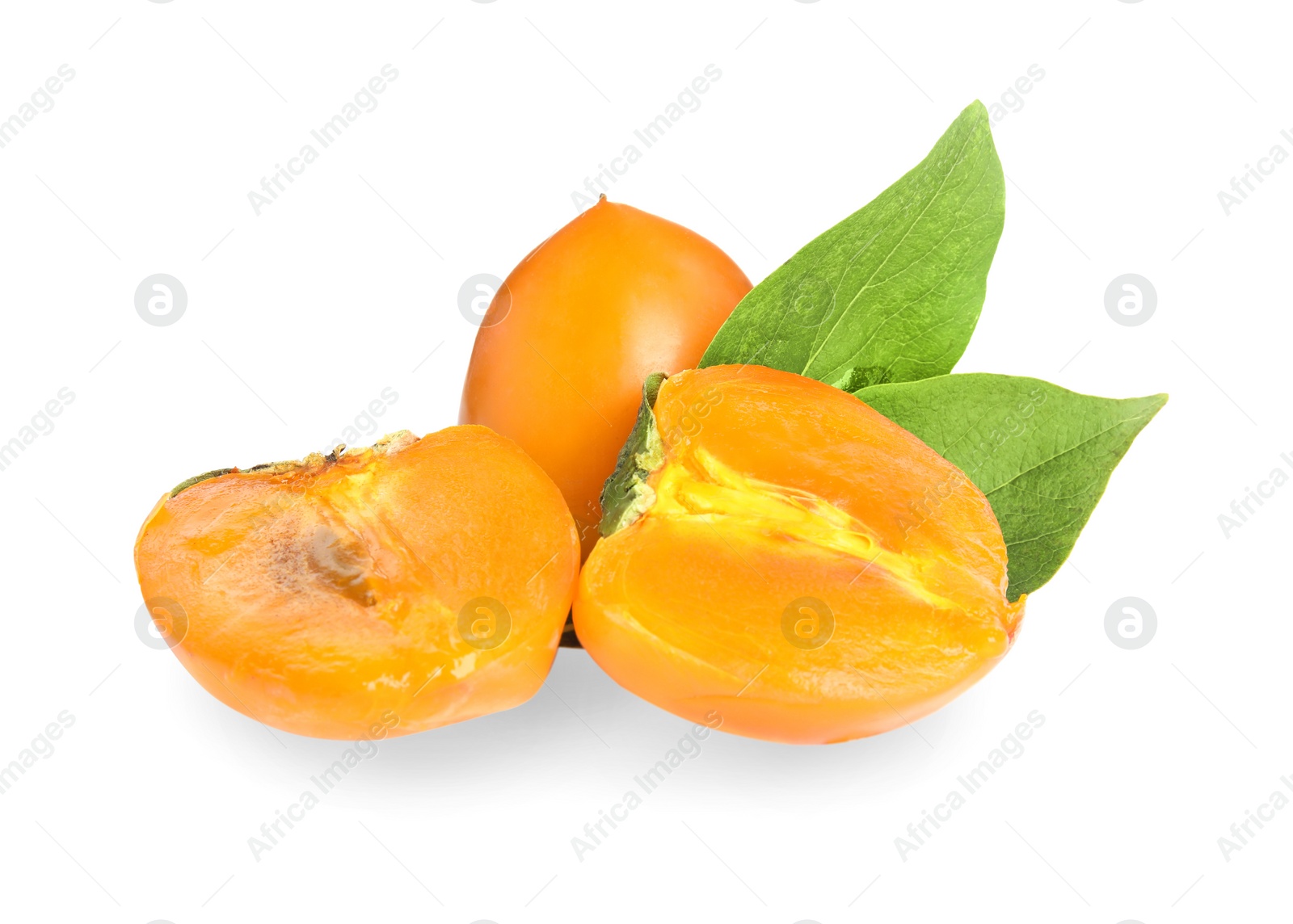 Delicious cut and whole persimmons isolated on white Photo of Delicious cut and whole persimmons isolated on white