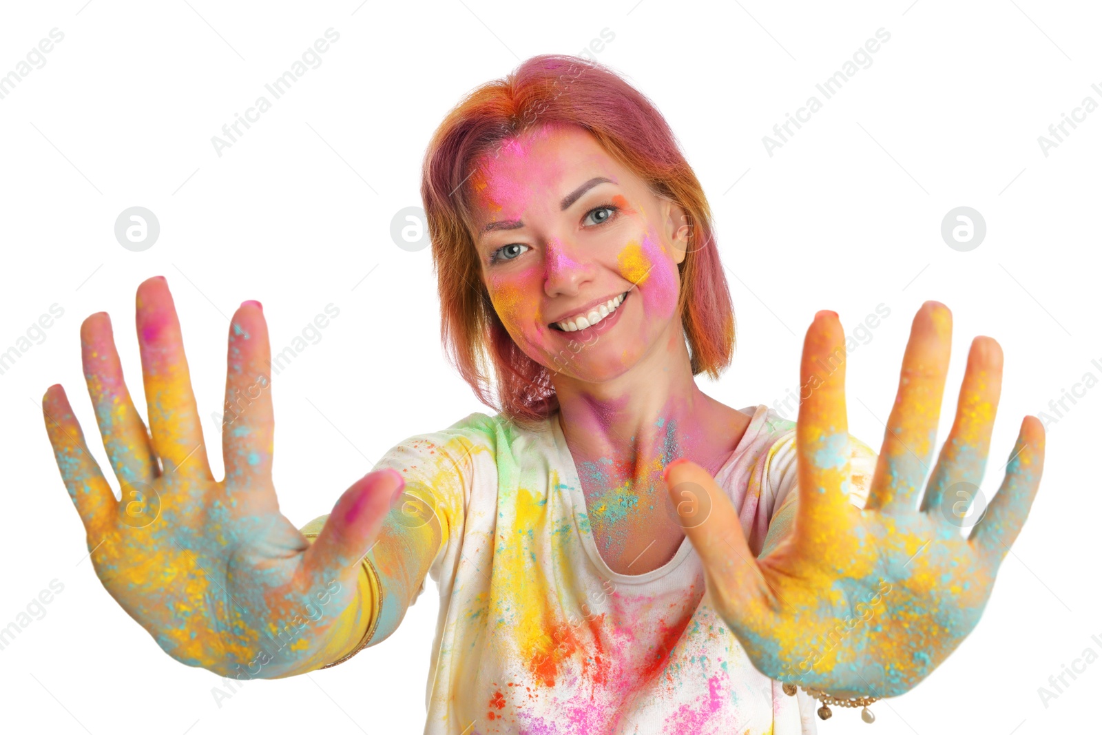 Woman covered with colorful powder dyes on white background. Holi festival celebration Photo of Woman covered with colorful powder dyes on white background. Holi festival celebration