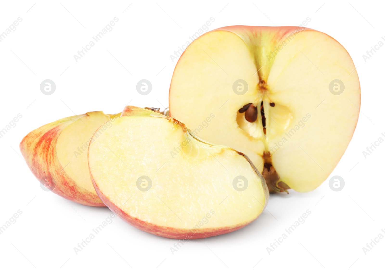 Fresh ripe red cut apple isolated on white Photo of Fresh ripe red cut apple isolated on white