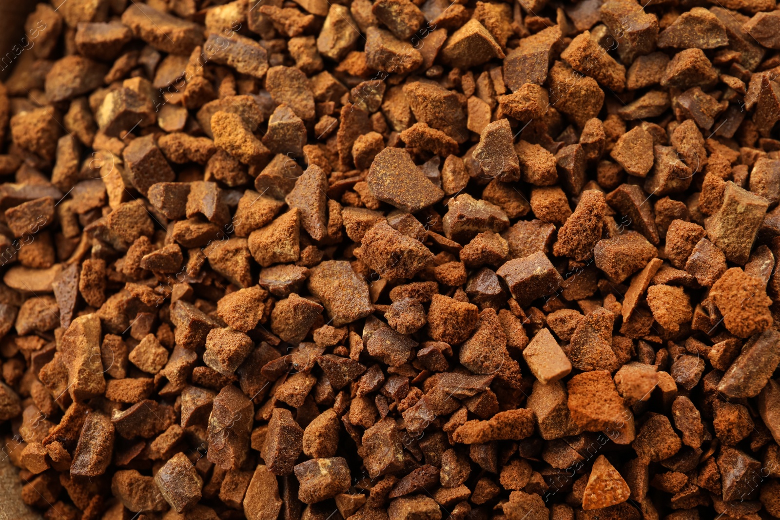 Pile of chicory granules as background, closeup Photo of Pile of chicory granules as background, closeup