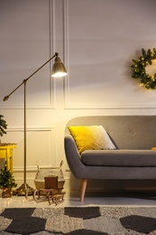 Photo of Stylish room with Christmas decorations. Festive interior design