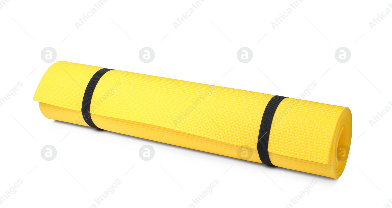 Yellow rolled mat isolated on white. Camping tourism equipment Photo of Yellow rolled mat isolated on white. Camping tourism equipment