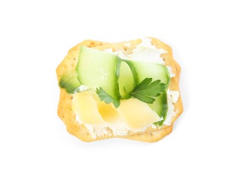 Delicious cracker with cream cheese, cucumber and parsley isolated on white, top view Photo of Delicious cracker with cream cheese, cucumber and parsley isolated on white, top view