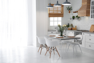 Photo of Beautiful kitchen interior with new stylish furniture