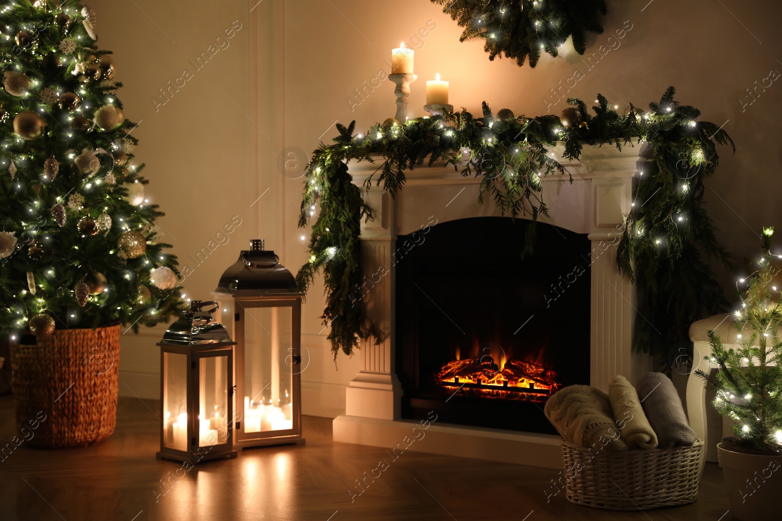 Beautiful room interior with fireplace and Christmas decor in evening Photo of Beautiful room interior with fireplace and Christmas decor in evening