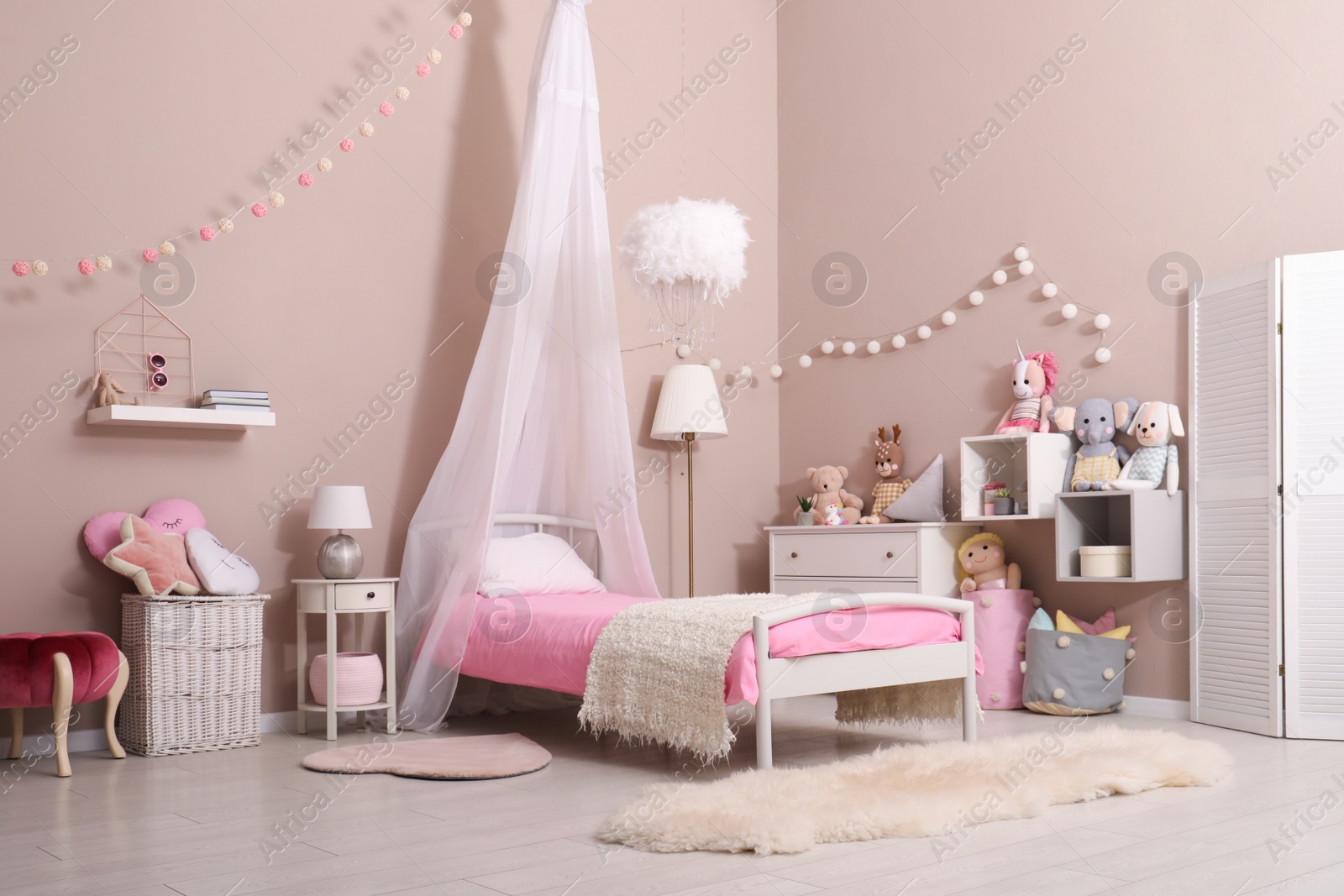 Cute child's room interior with toys and modern furniture Photo of Cute child's room interior with toys and modern furniture