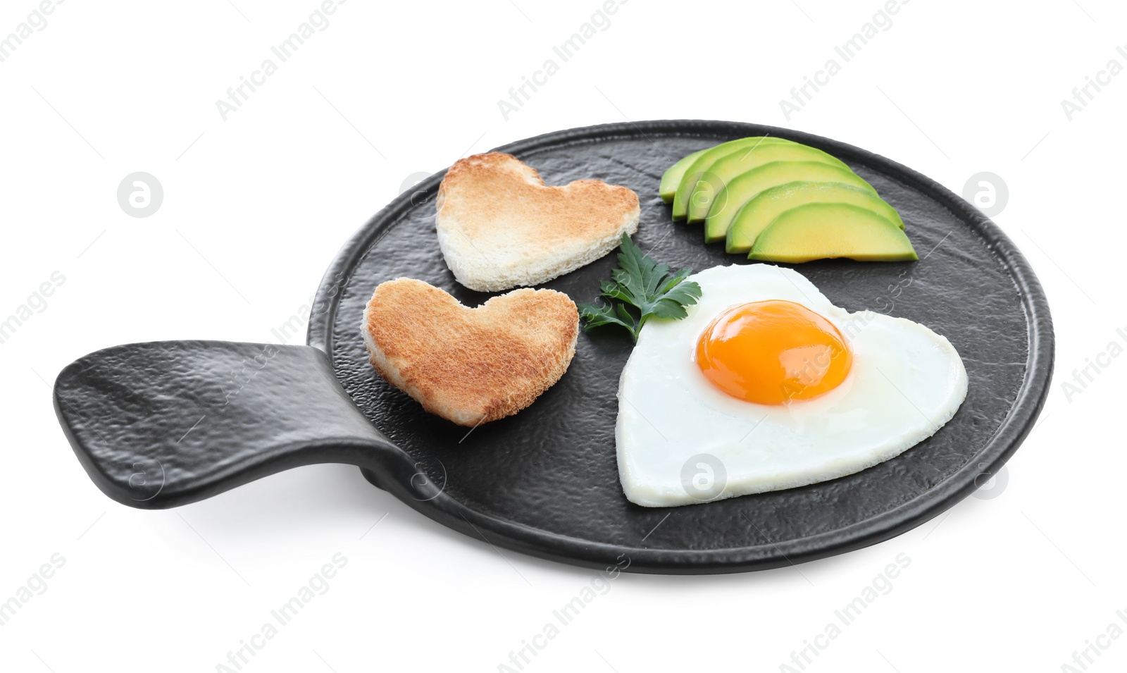 Romantic breakfast with fried heart shaped egg, avocado and toasts isolated on white. Valentine's day celebration Photo of Romantic breakfast with fried heart shaped egg, avocado and toasts isolated on white. Valentine's day celebration