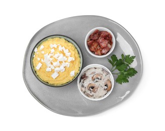 Tasty banosh with brynza, pork cracklings and mushrooms on white background, top view. Traditional Ukrainian dish Photo of Tasty banosh with brynza, pork cracklings and mushrooms on white background, top view. Traditional Ukrainian dish