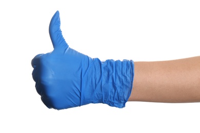 Woman in blue latex gloves showing thumb up gesture on white background, closeup of hand Photo of Woman in blue latex gloves showing thumb up gesture on white background, closeup of hand