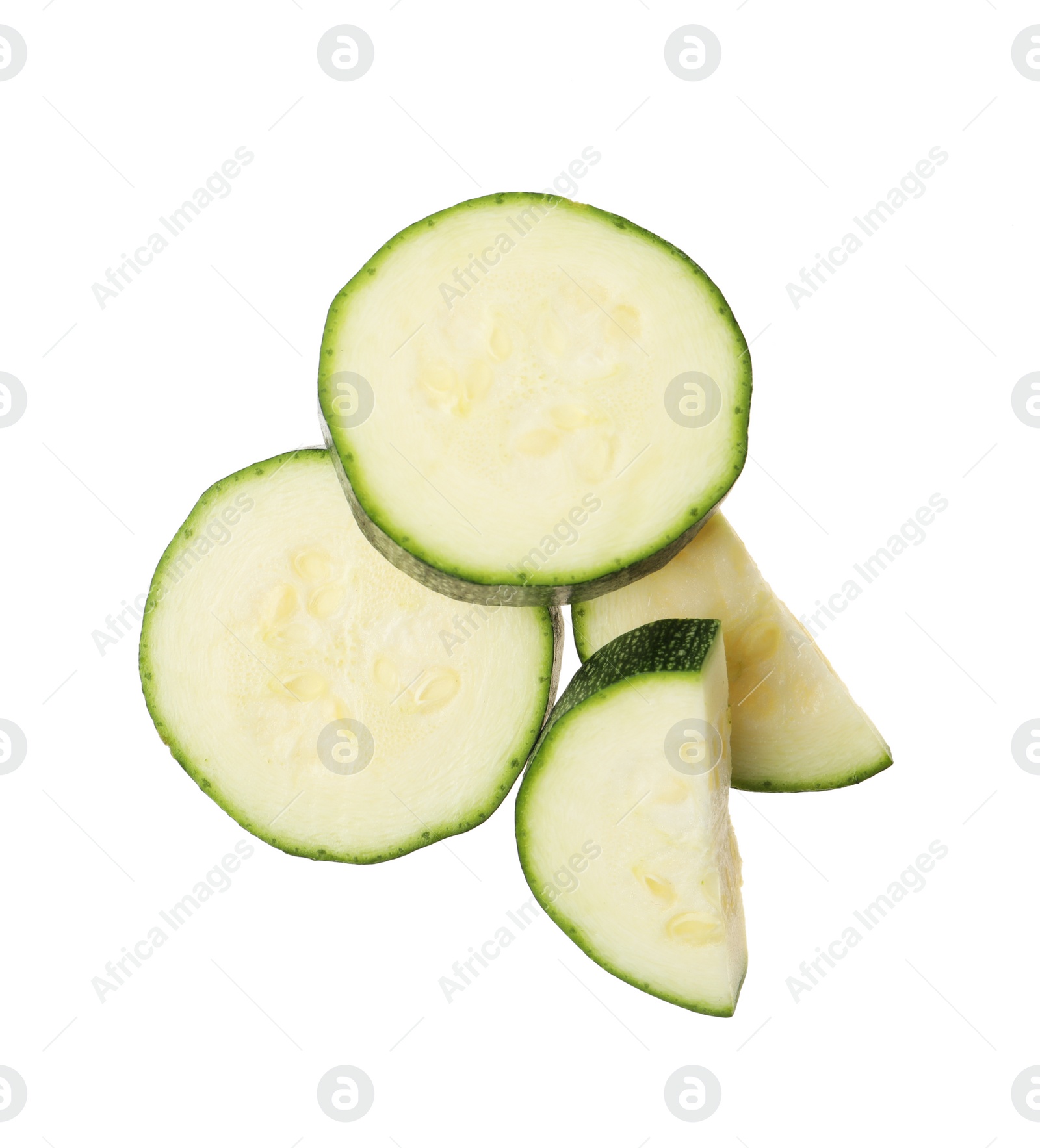 Slices of ripe zucchini on white background, top view Photo of Slices of ripe zucchini on white background, top view