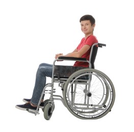 Teen boy in wheelchair on white background Photo of Teen boy in wheelchair on white background