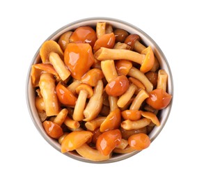 Tasty marinated mushrooms in bowl isolated on white, top view Photo of Tasty marinated mushrooms in bowl isolated on white, top view