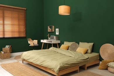 Stylish bedroom with modern furniture. Interior design Photo of Stylish bedroom with modern furniture. Interior design