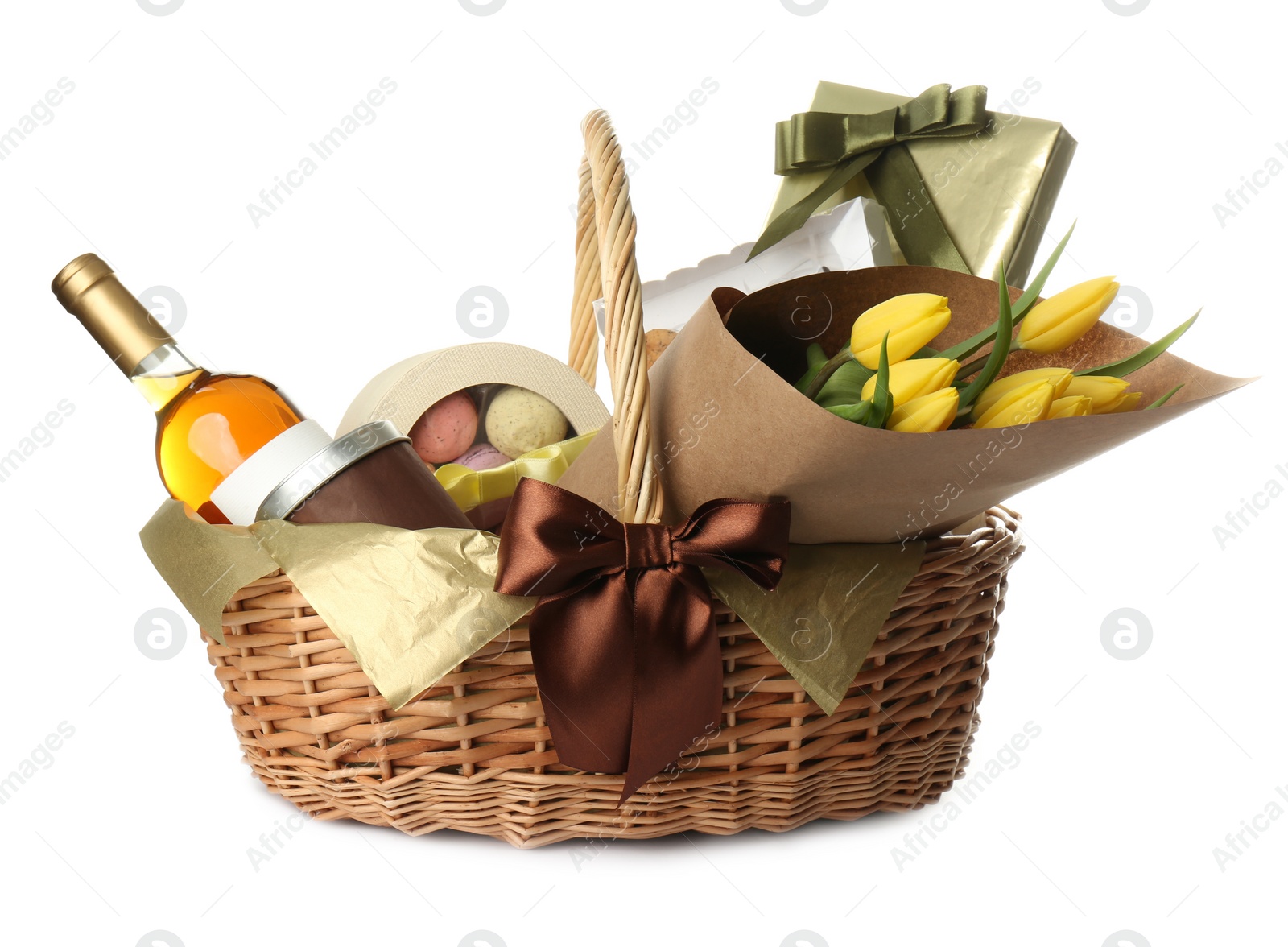 Wicker basket full of presents isolated on white Photo of Wicker basket full of presents isolated on white