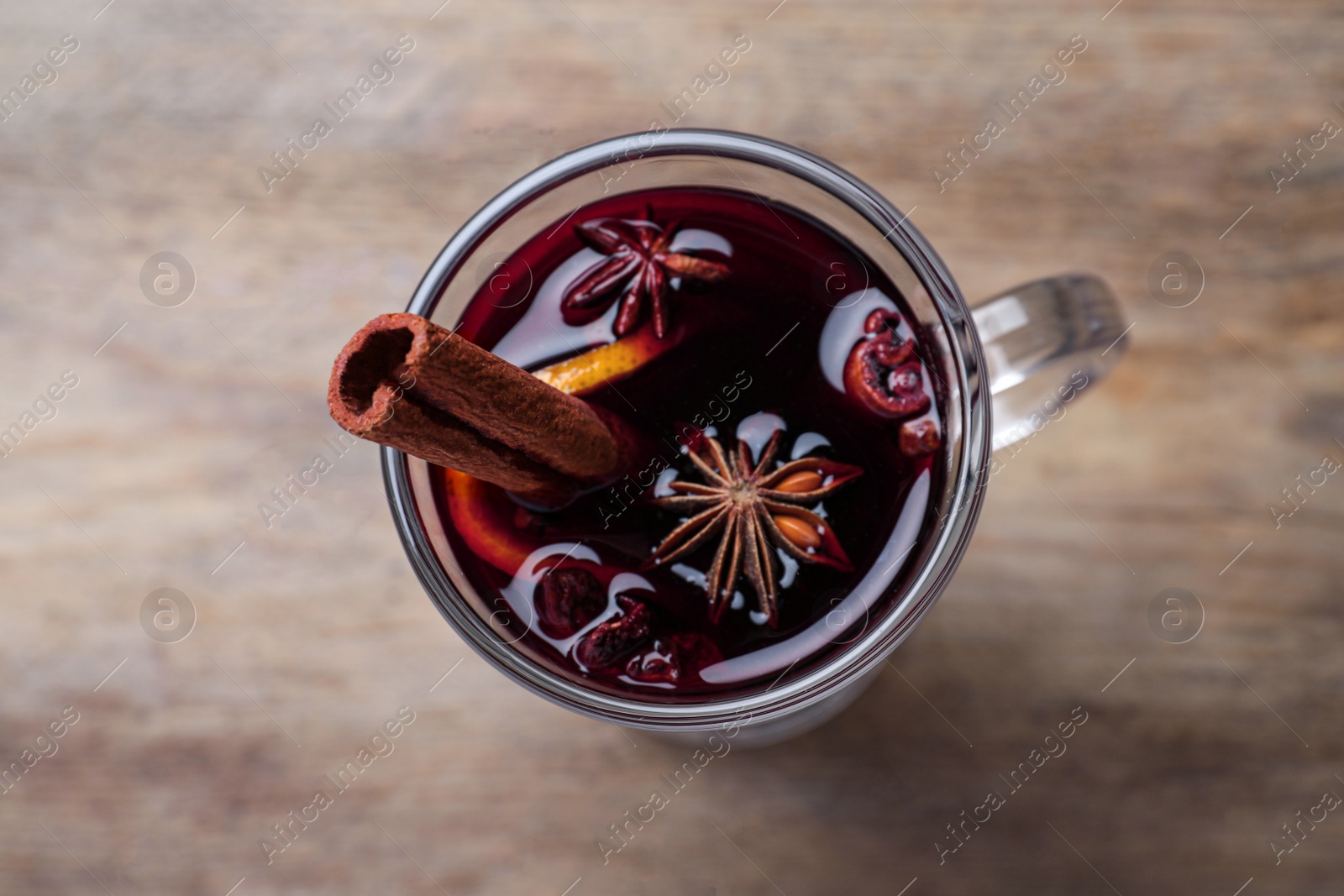 Delicious red mulled wine on table, top view Photo of Delicious red mulled wine on table, top view
