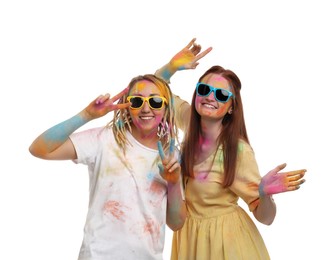 Women covered with colorful powder dyes on white background. Holi festival celebration Photo of Women covered with colorful powder dyes on white background. Holi festival celebration