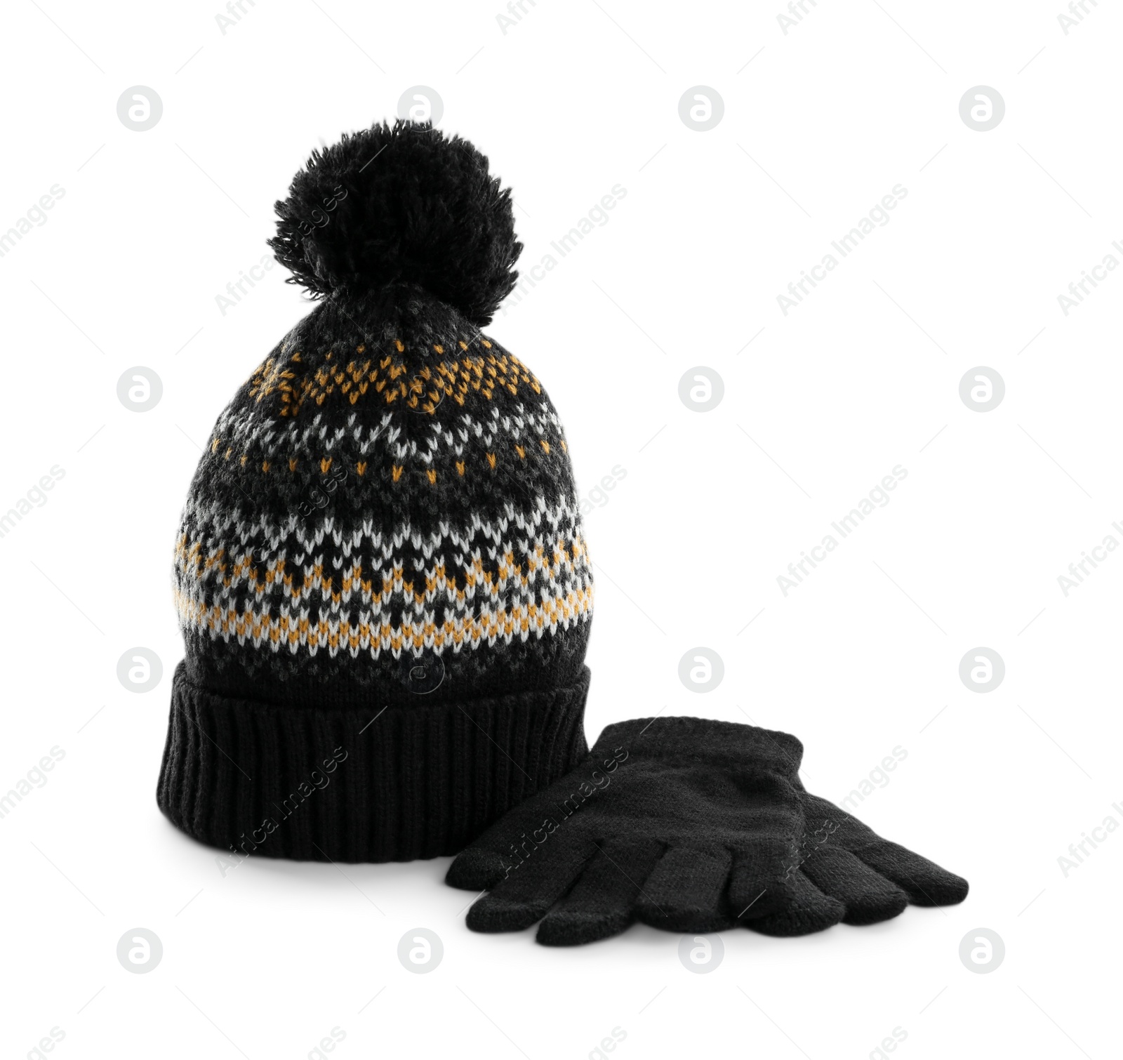 Photo of Woolen gloves and hat on white background
