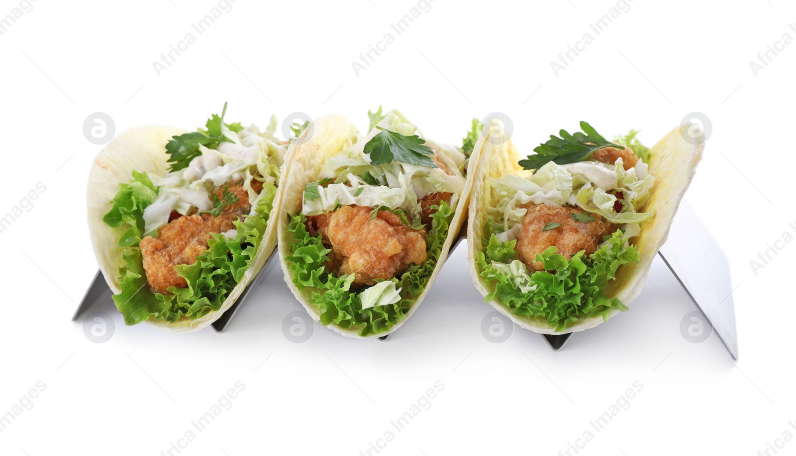 Yummy fish tacos in holder isolated on white Photo of Yummy fish tacos in holder isolated on white