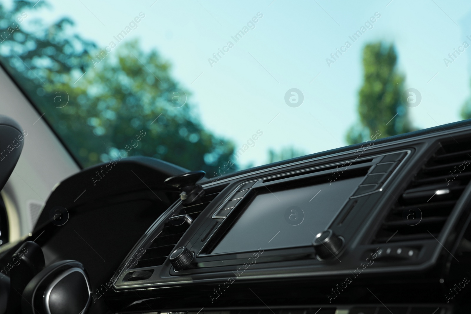 Photo of View of dashboard with navigation system in modern car