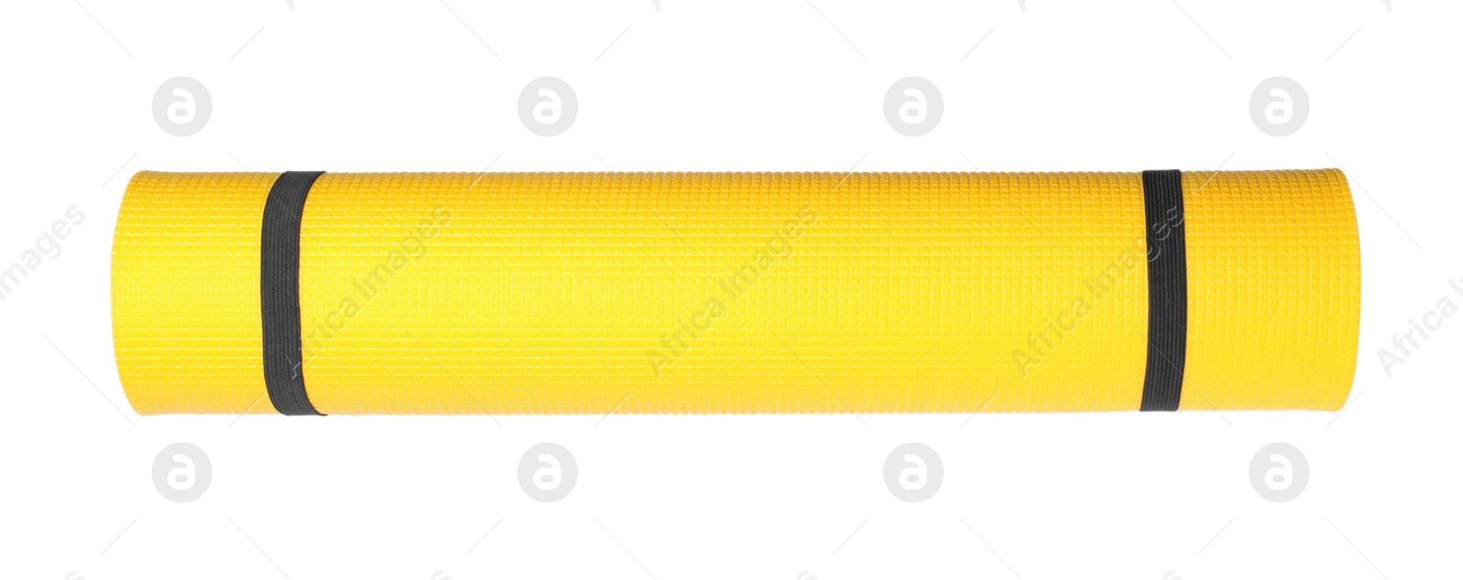 Yellow rolled camping or exercise mat on white background, top view Photo of Yellow rolled camping or exercise mat on white background, top view