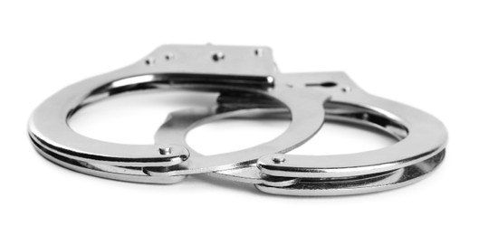 New classic chain handcuffs on white background Photo of New classic chain handcuffs on white background