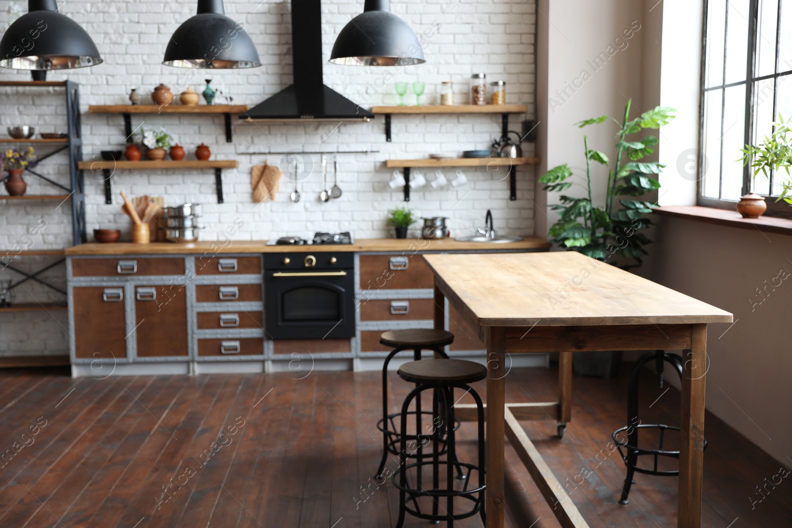 Beautiful kitchen interior with new stylish furniture Photo of Beautiful kitchen interior with new stylish furniture