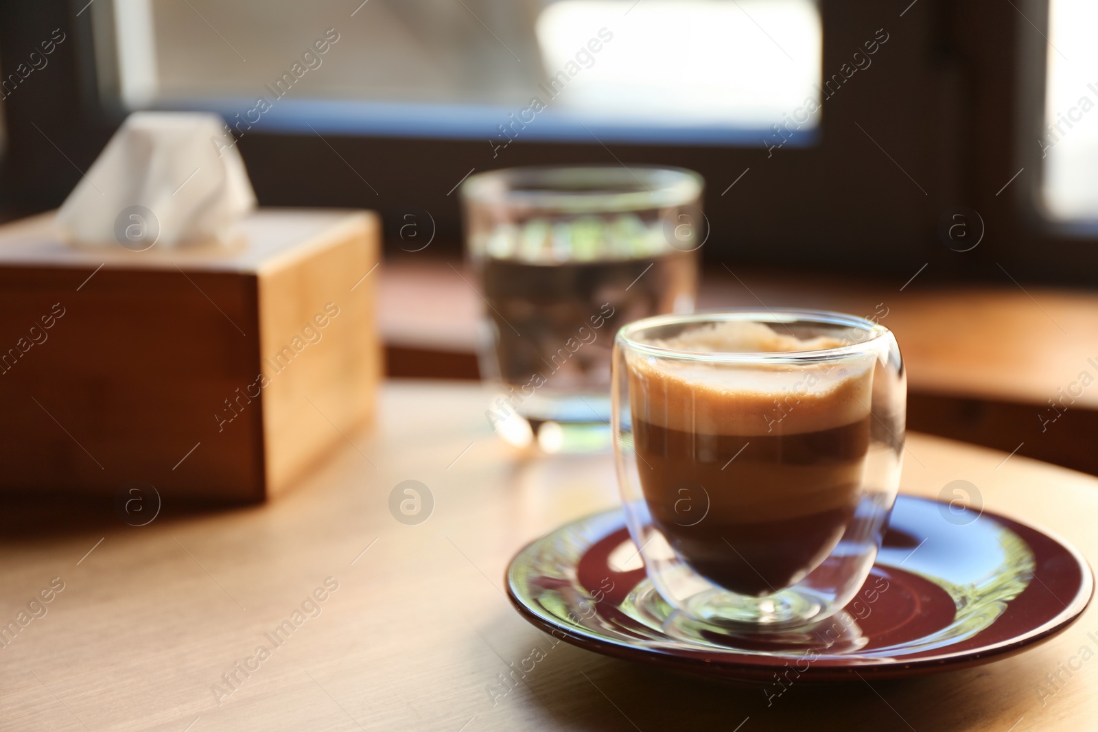Aromatic coffee on wooden table in cafe. Space for text Photo of Aromatic coffee on wooden table in cafe. Space for text