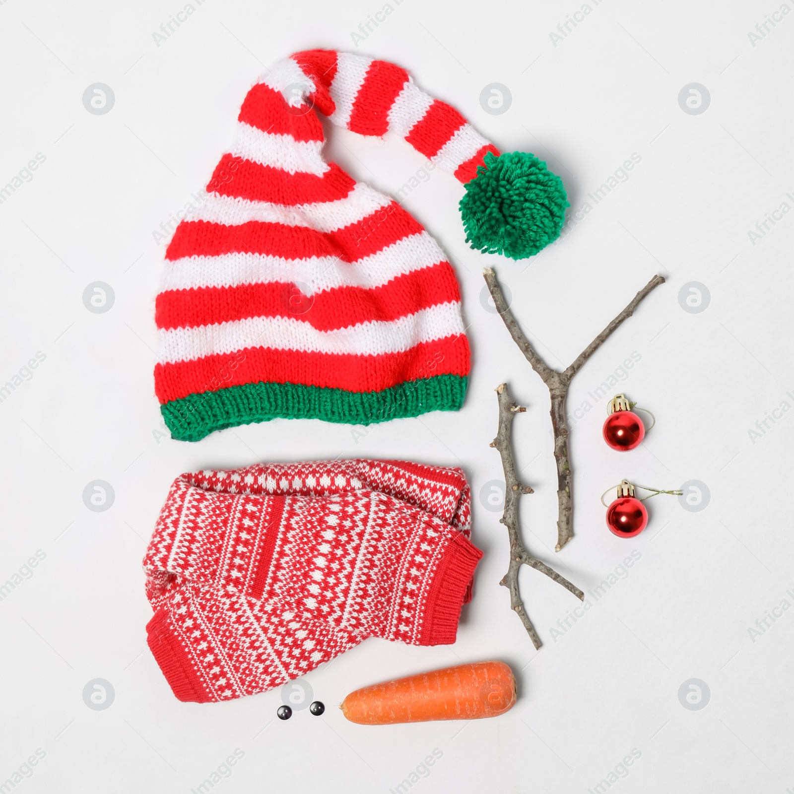 Set of materials for snowman on white background, flat lay Photo of Set of materials for snowman on white background, flat lay