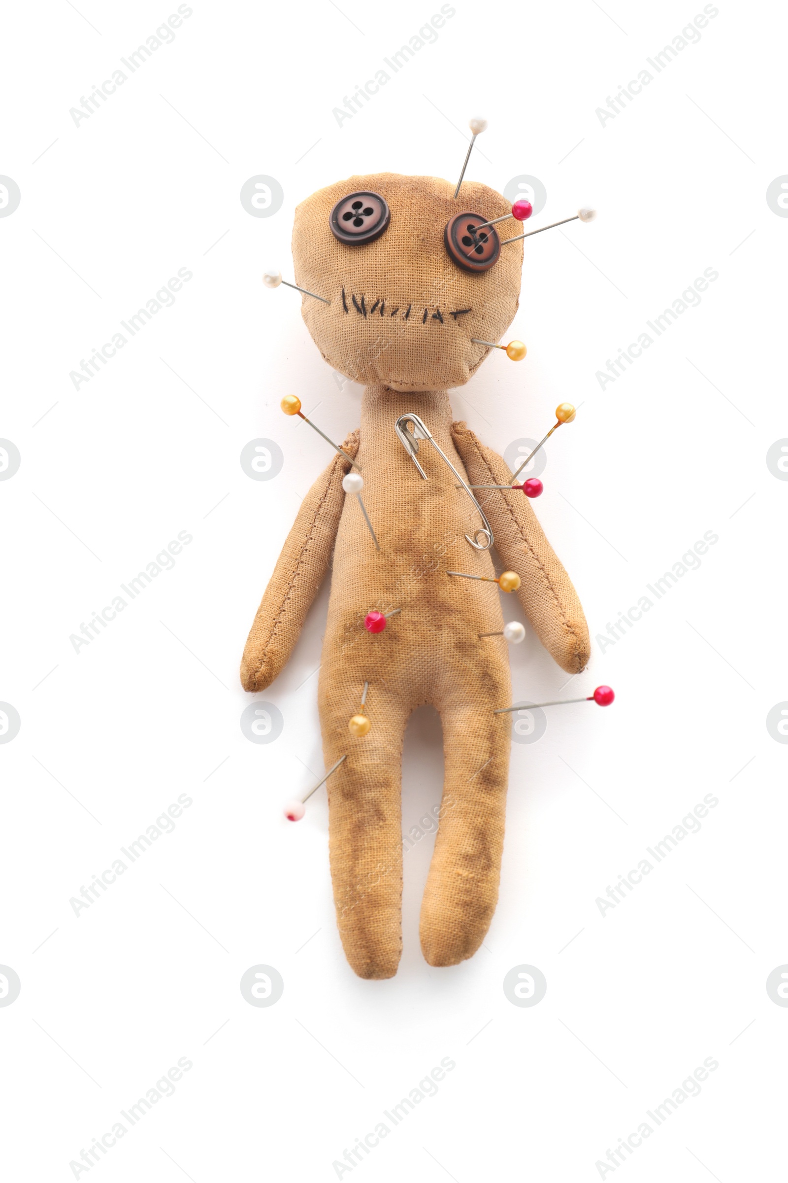 Voodoo doll with pins isolated on white Photo of Voodoo doll with pins isolated on white