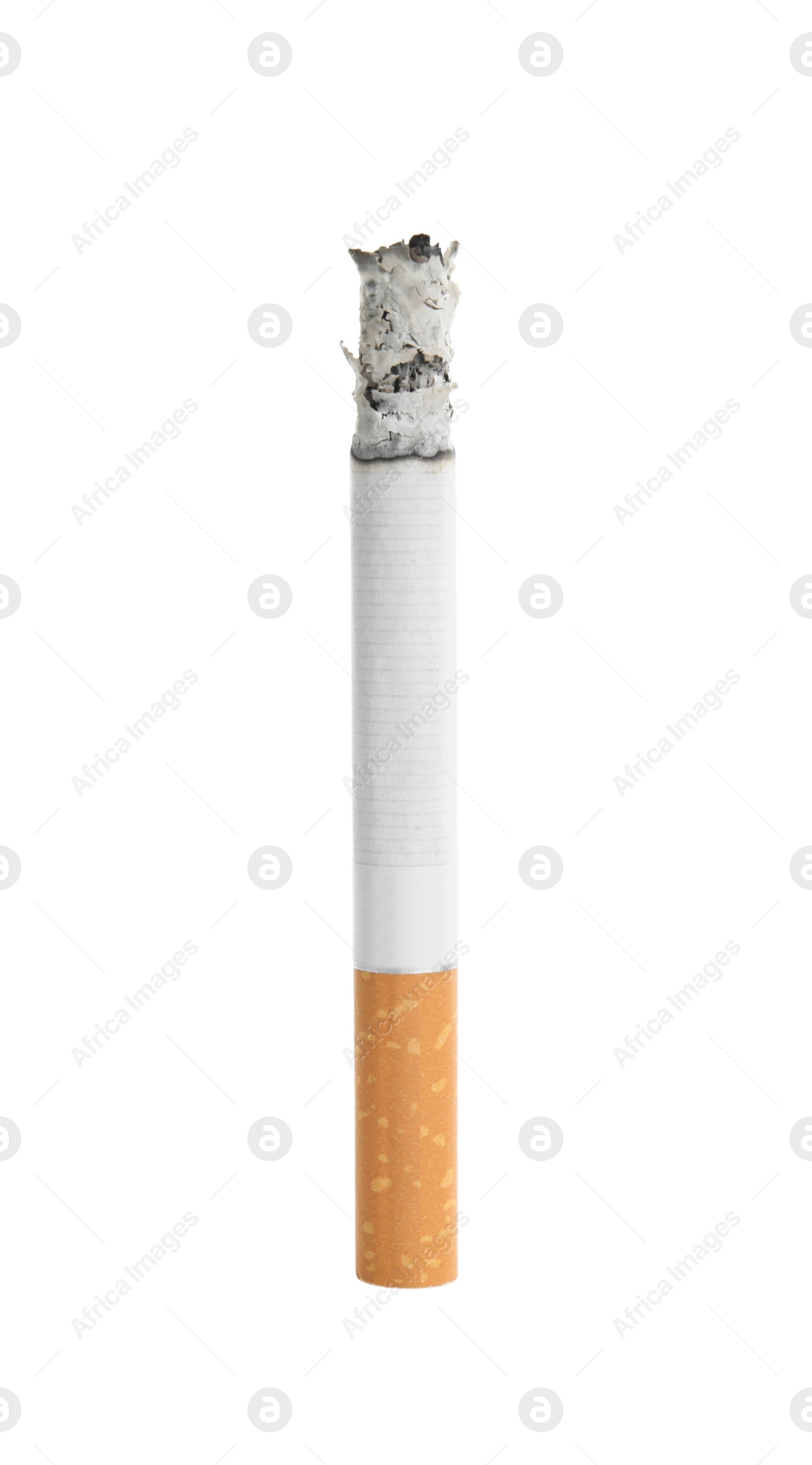 Cigarette with orange filter smoldering on white background Photo of Cigarette with orange filter smoldering on white background