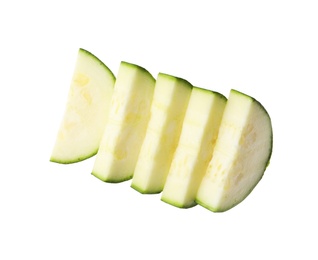 Slices of ripe zucchini on white background, top view Photo of Slices of ripe zucchini on white background, top view