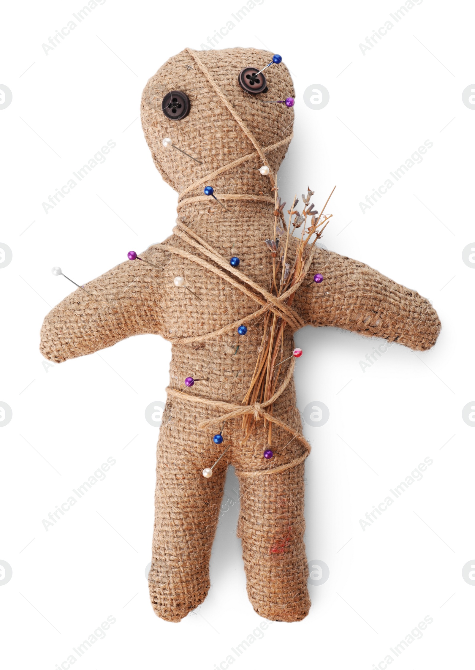 Voodoo doll with pins and dried flowers isolated on white Photo of Voodoo doll with pins and dried flowers isolated on white