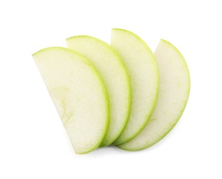 Slices of apple on white background, top view Photo of Slices of apple on white background, top view