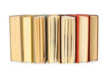 Lots of library books on white background Photo of Lots of library books on white background