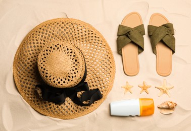 Flat lay composition with beach objects on sand Photo of Flat lay composition with beach objects on sand
