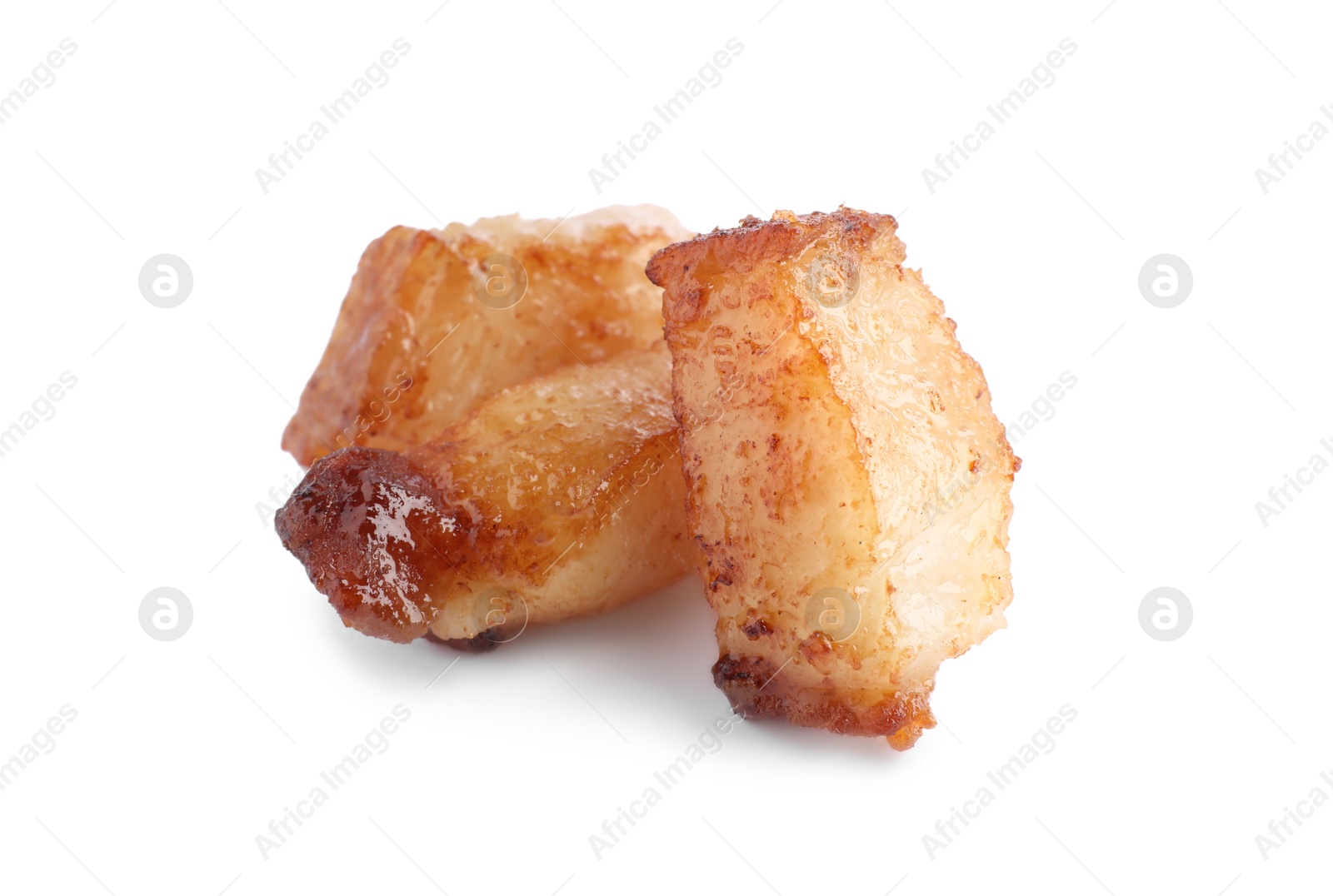 Tasty fried cracklings on white background. Cooked pork lard Photo of Tasty fried cracklings on white background. Cooked pork lard