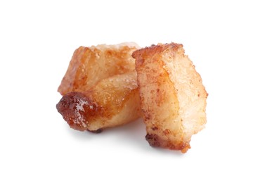 Tasty fried cracklings on white background. Cooked pork lard Photo of Tasty fried cracklings on white background. Cooked pork lard