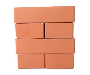 Many red bricks on white background. Building material Photo of Many red bricks on white background. Building material