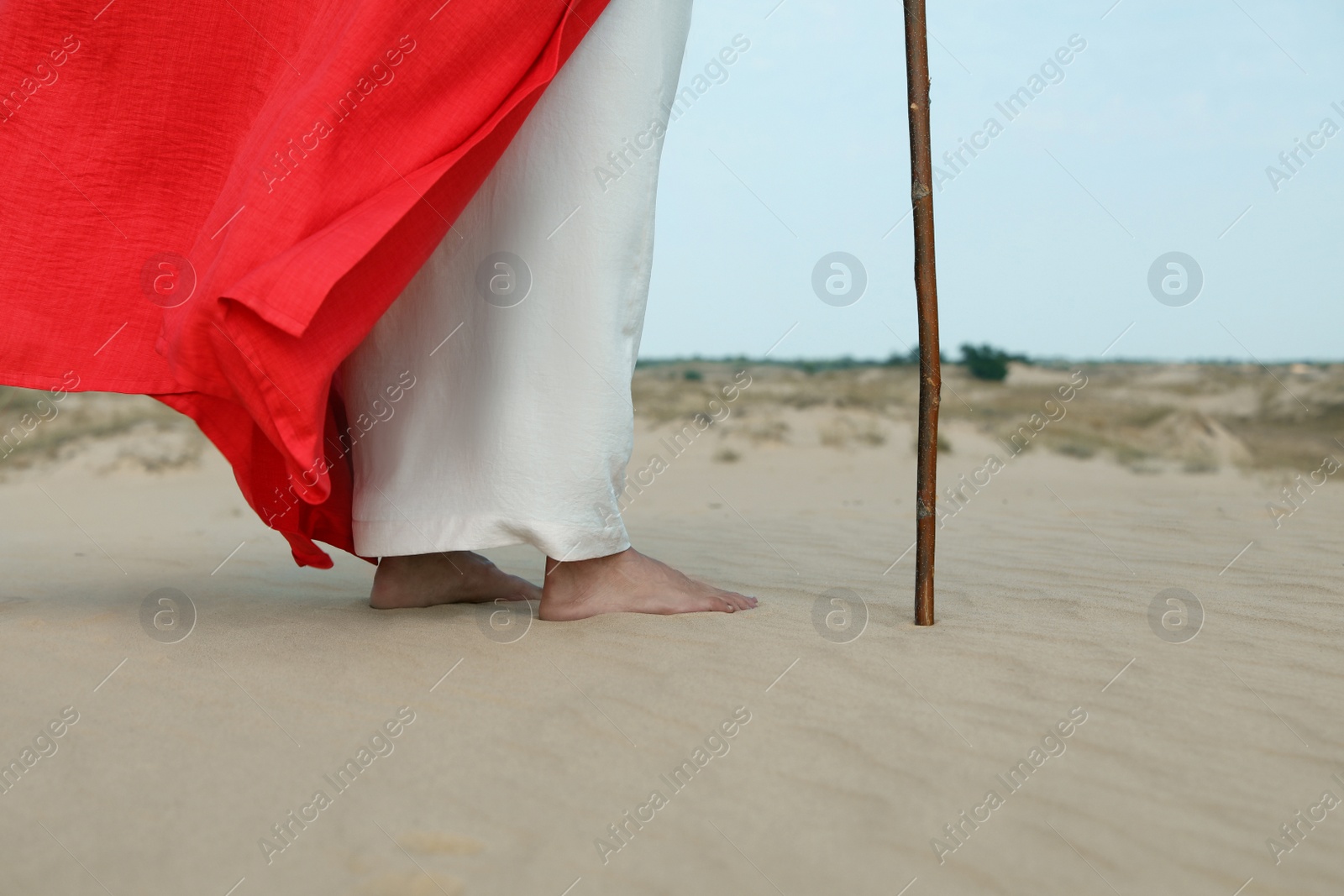 Jesus Christ walking in desert, closeup view Photo of Jesus Christ walking in desert, closeup view